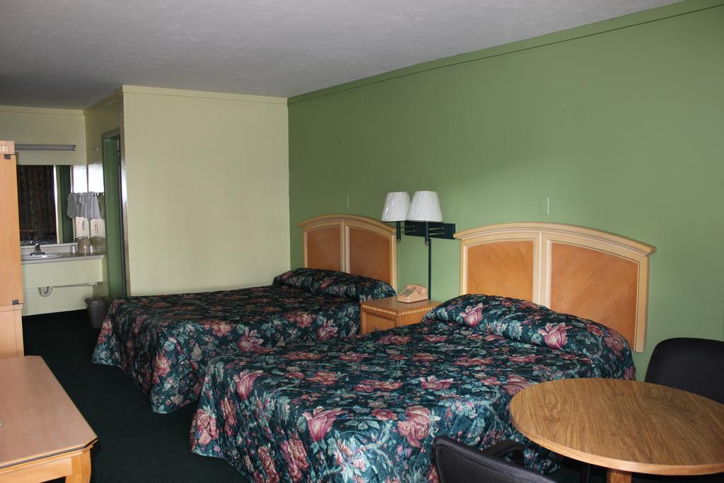 Travelers Inn Gainesville Bilik gambar